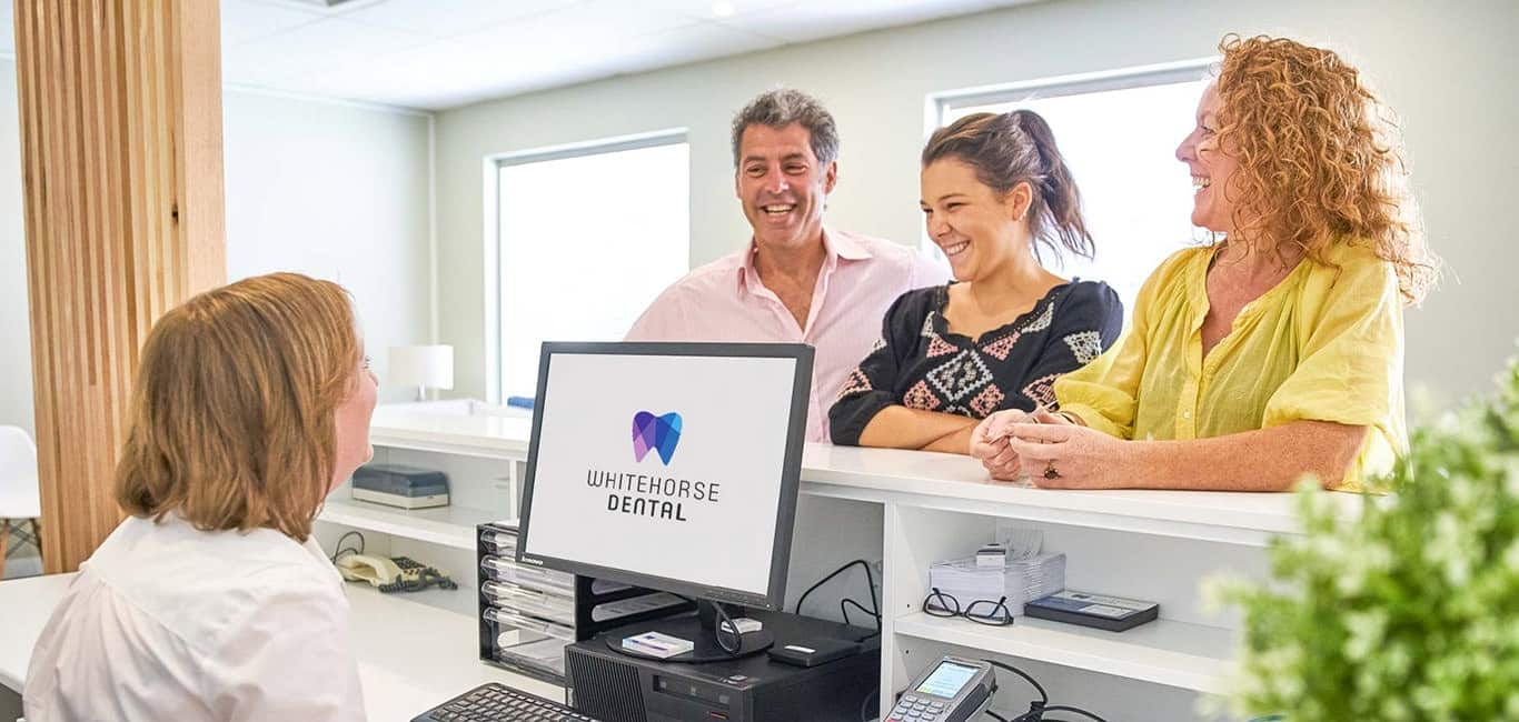 smiling people visiting Whitehorse Dental, a dental clinic in Blackburn