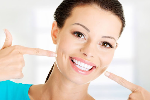 woman showing her white teeth