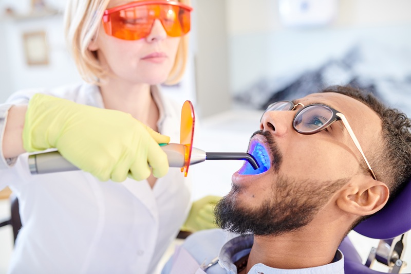 Undergoing Teeth Whitening Procedure